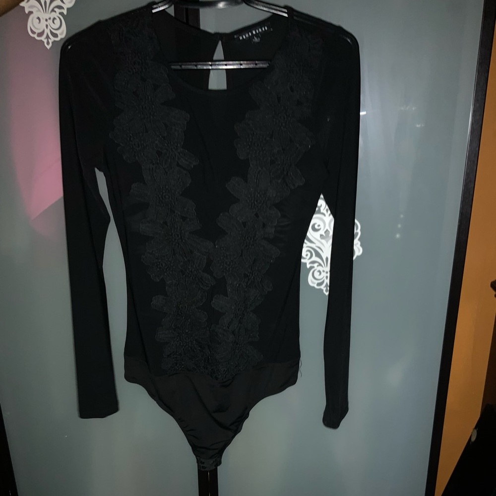 Beautiful black bodysuit with lace flower accent
